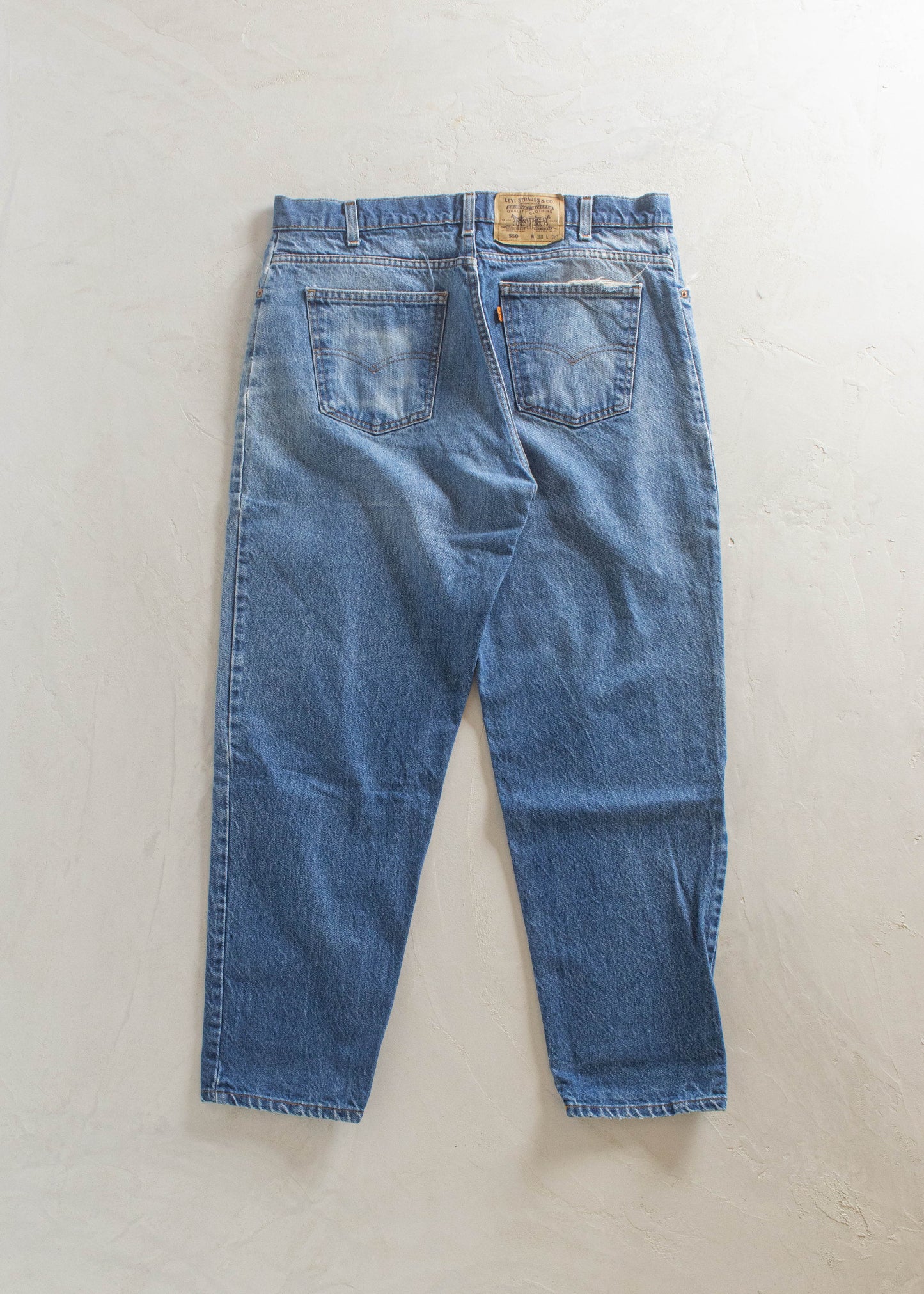 1980s Levi's 550 Orange Tab Midwash Jeans Size Women's 33 Men's 36